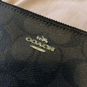 Signature Nolita Coach Wristlet